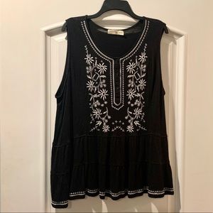 Cute black top with white floral detail